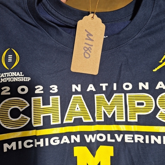 A Nike official Michigan Wolverine dri-fit tee shirt in a men's small. NWOT - Picture 4 of 6